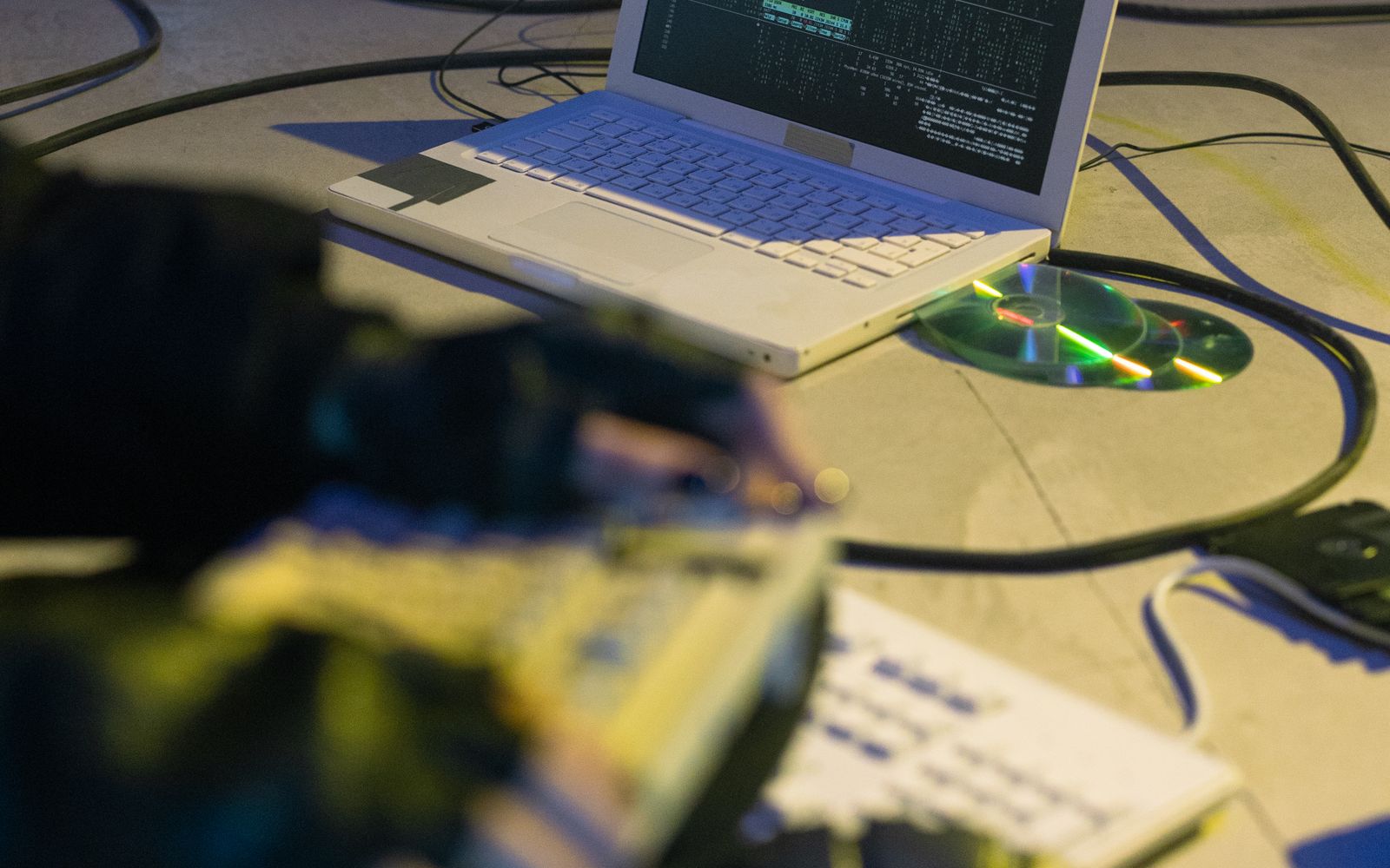 Application code displayed on a laptop representing web-application and API security engineering.