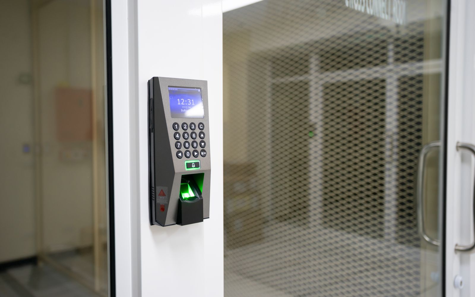 Modern fingerprint access-control terminal representing identity and access policy enforcement.